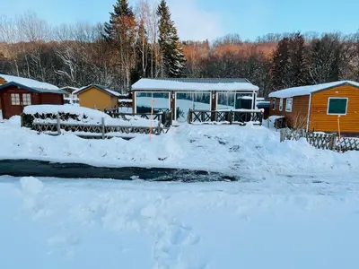 L'établissement Le 77 - chalet nature proche S.Besse en hiver