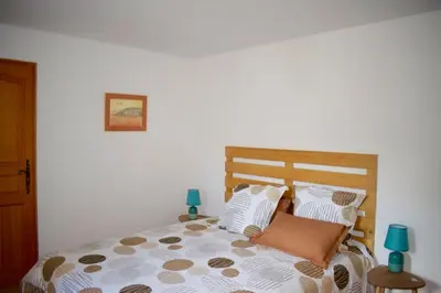 Un ou plusieurs lits dans un hébergement de l'établissement Suite Familiale 2 chambres double