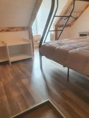 Un ou plusieurs lits dans un hébergement de l'établissement Bienvenue chez les ch'oups ' la ooh'