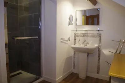 Salle de bains dans l'établissement Chambres d'hôtes de La Vieille Ferme