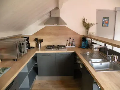 Cuisine ou kitchenette dans l'établissement Basilic, 4 pers. Villa Saint Antoine, Orcival, Sancy Auvergne