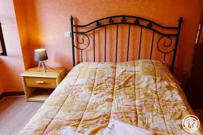 Un ou plusieurs lits dans un hébergement de l'établissement Presbytere