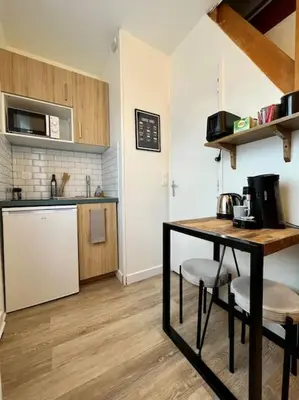 Cuisine ou kitchenette dans l'établissement Duplex à 5 min de la gare-DABNB