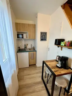 Cuisine ou kitchenette dans l'établissement Duplex à 5 min de la gare-DABNB