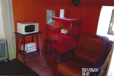 Cuisine ou kitchenette dans l'établissement Maison atypique du Cantal proche Lot et Corrèze