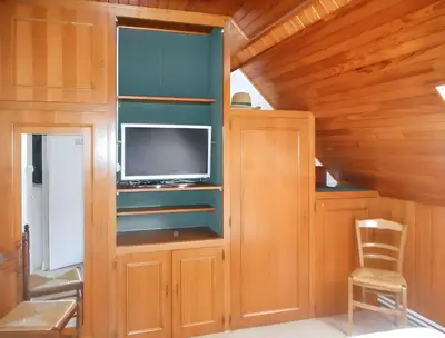 Télévision ou salle de divertissement dans l'établissement Appartement familial à La Bourboule - 55 m² avec TV dans la chambre
