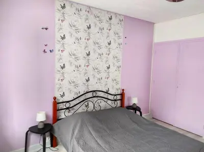 Un ou plusieurs lits dans un hébergement de l'établissement Tulipe, appartement 5 personnes, entre Sancy et Volcans d'Auvergne