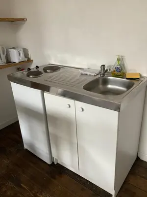 Cuisine ou kitchenette dans l'établissement Studio tout équipé plein centre-ville de Limoges