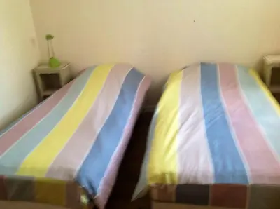 Un ou plusieurs lits dans un hébergement de l'établissement Appartement confortable à Saint-Martin, 60 m², jardin spacieux