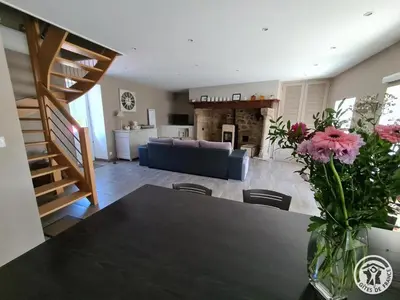 Coin salon dans l'établissement Le chapelou