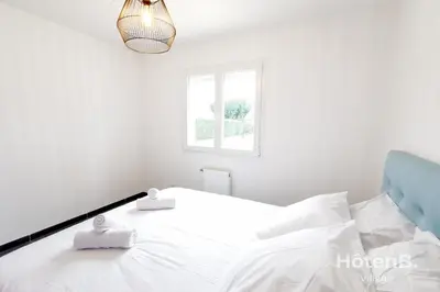 Un ou plusieurs lits dans un hébergement de l'établissement Les Myrtilles - Maison 6 personnes à Limoges