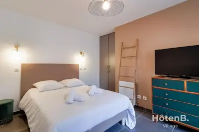 Un ou plusieurs lits dans un hébergement de l'établissement Les Myrtilles - Maison 6 personnes à Limoges