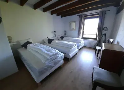 Un ou plusieurs lits dans un hébergement de l'établissement Belle Longere de 10 couchages - lac de vassiviere