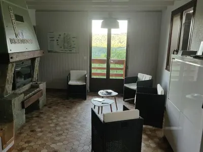Télévision ou salle de divertissement dans l'établissement Gîte des 4 éléments