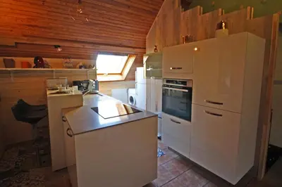 Cuisine ou kitchenette dans l'établissement Rosalie