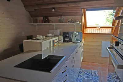 Cuisine ou kitchenette dans l'établissement Rosalie
