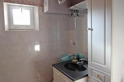 Cuisine ou kitchenette dans l'établissement Rosalie