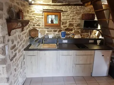 Cuisine ou kitchenette dans l'établissement Le Four de La Jugie