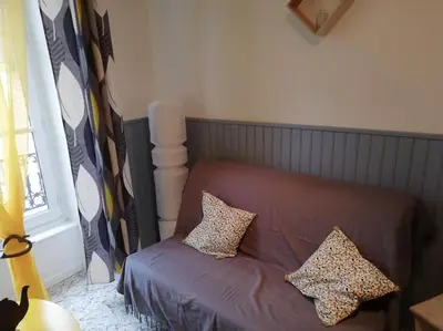 Coin salon dans l'établissement Le nid douillet Univers linge fourni