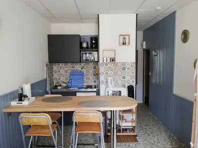 Cuisine ou kitchenette dans l'établissement Le nid douillet Univers linge fourni