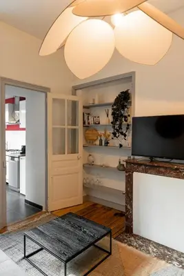 Cuisine ou kitchenette dans l'établissement Appart chaleureux face gare
