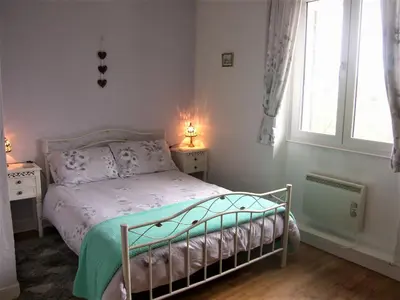 Un ou plusieurs lits dans un hébergement de l'établissement Fontchauvaux Holiday Gites
