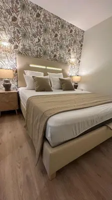 Un ou plusieurs lits dans un hébergement de l'établissement Appartement cosy
