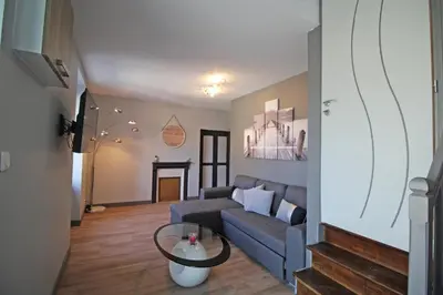 Télévision ou salle de divertissement dans l'établissement Le paradis de caux