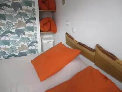 Un ou plusieurs lits dans un hébergement de l'établissement Gîte les Bois - 45 m2