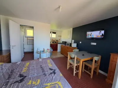 Cuisine ou kitchenette dans l'établissement Le Paradis de Marie
