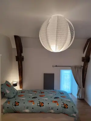 Un ou plusieurs lits dans un hébergement de l'établissement Au Grand Bonheur - Gîte Padirac - Rocamadour
