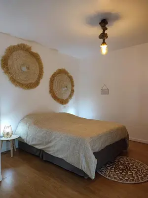 Un ou plusieurs lits dans un hébergement de l'établissement Au Grand Bonheur - Gîte Padirac - Rocamadour