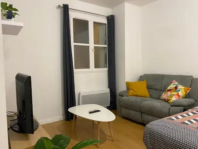 Coin salon dans l'établissement Studio chaleureux Centre Ville