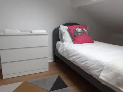 Un ou plusieurs lits dans un hébergement de l'établissement La Vieille Maison aux Canards