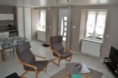 Coin salon dans l'établissement maison de vacances Nébouzat