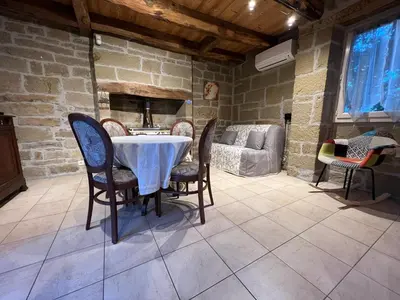 Coin salon dans l'établissement Le Pigeonnier de Lissac