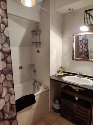 Salle de bains dans l'établissement Chez Philopin