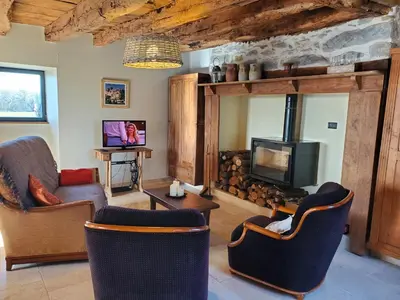 Télévision ou salle de divertissement dans l'établissement Le Pech de Vigne