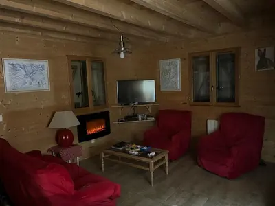 Télévision ou salle de divertissement dans l'établissement Chalet des Monts Dore