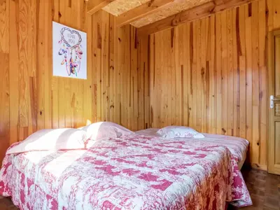 Un ou plusieurs lits dans un hébergement de l'établissement Holiday Home Le Noisetier by Interhome