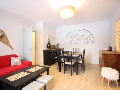 Coin salon dans l'établissement Bel appartement T3 au Mont-Dore avec parking et WiFi - FR-1-608-240