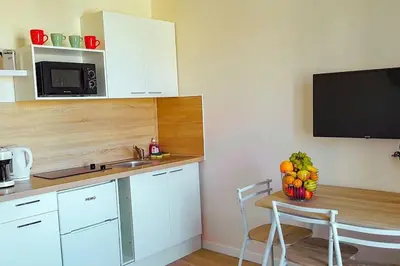 Cuisine ou kitchenette dans l'établissement Vue coup de cœur idéalement situé, proche Gare