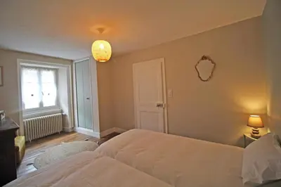 Un ou plusieurs lits dans un hébergement de l'établissement La maison de marie