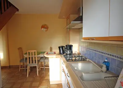 Cuisine ou kitchenette dans l'établissement Le val des deux rieux
