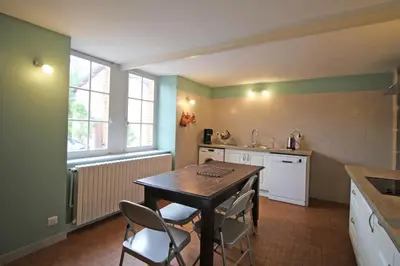 Cuisine ou kitchenette dans l'établissement L'orangerie