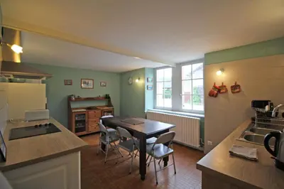 Cuisine ou kitchenette dans l'établissement L'orangerie