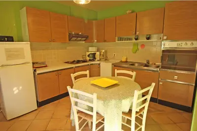 Cuisine ou kitchenette dans l'établissement Bel air