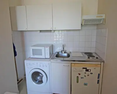 Cuisine ou kitchenette dans l'établissement Le pompadour