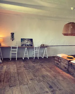 Coin salon dans l'établissement Chateau de Cours