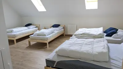 Un ou plusieurs lits dans un hébergement de l'établissement Le Puy de Côme
